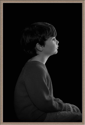 Studio Portrait Photography of Child's Profile in Black-and-White